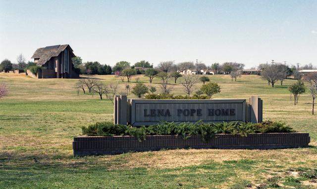 March 4, 1999: View of the Lena Pope Home that has leased 21 acres for a 225,000-square-foot shopping center that will be developed on the north and east sides of the home's property near Interstate 30 and Hulen Street in Fort Worth. The Chapel Hill Shopping Center is home to Central Market today.